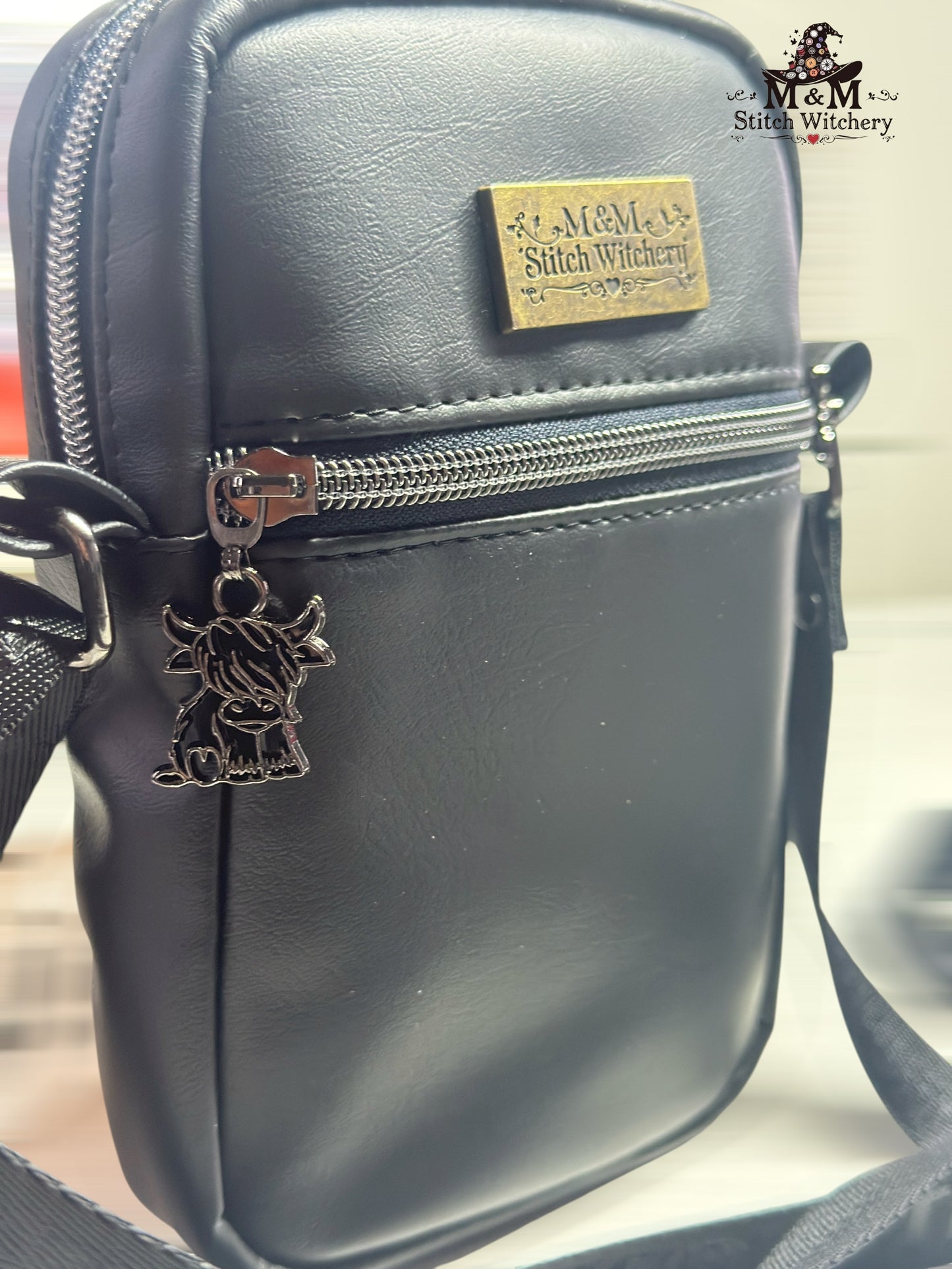 On the Go Mini Sling (Baby Highland Cow)